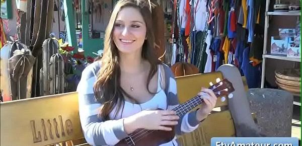  Sexy big tit natural brunette Summer play the ukulele in public and reveal her big boobs